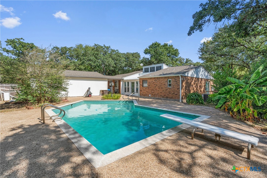 2007 O'Kelley Road Rockdale, TX 76567 - Photo 35 of 40 a front view of a house with a yard and a garden
