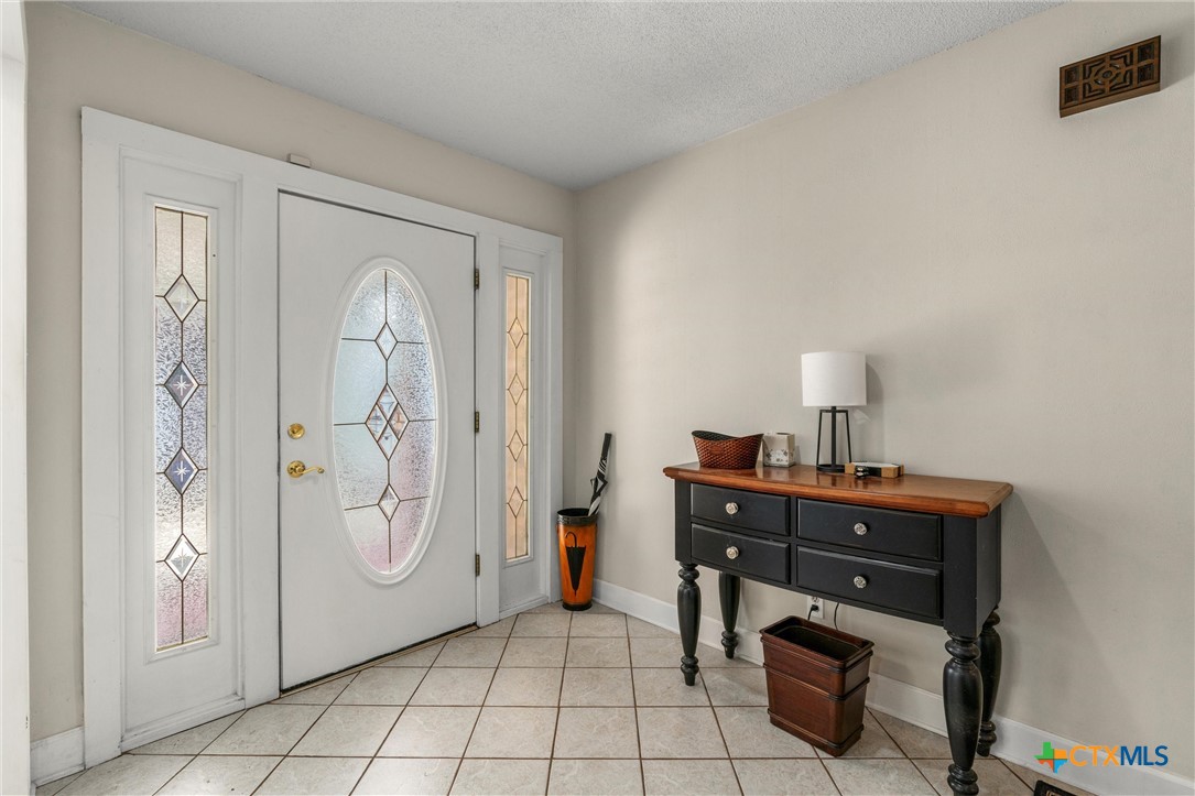 2007 O'Kelley Road Rockdale, TX 76567 - Photo 9 of 40 a room with a cabinets and a table