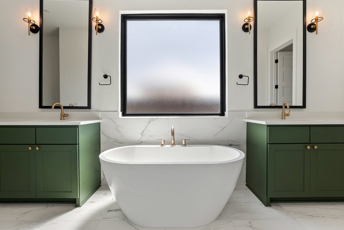 6010 Adhara Pass Austin, TX 78730 - Photo 15 of 40 a bathroom with a sink and a mirror