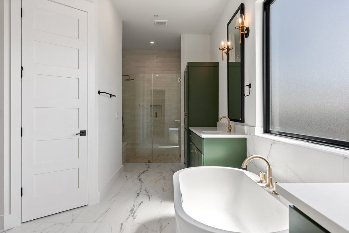 6010 Adhara Pass Austin, TX 78730 - Photo 16 of 40 a bathroom with a sink and mirror