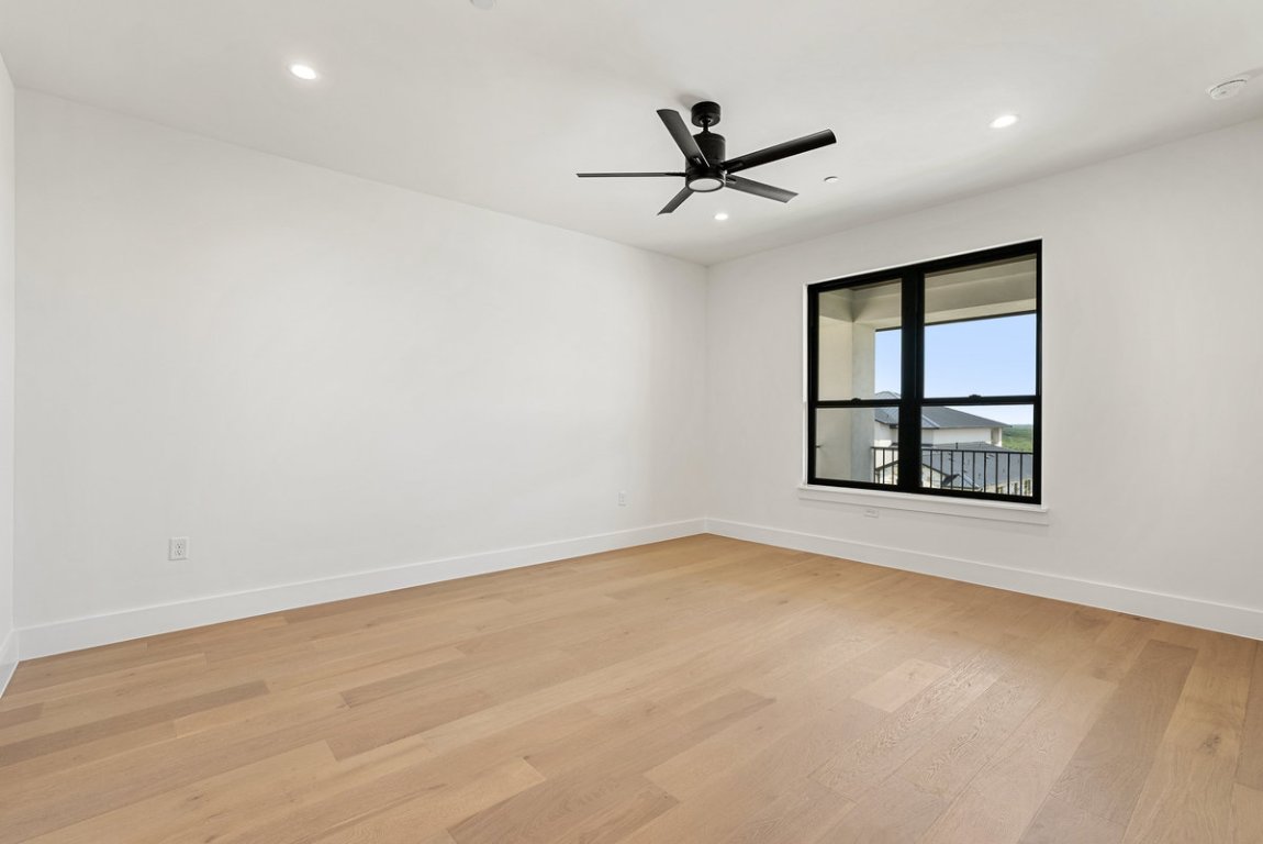 6010 Adhara Pass Austin, TX 78730 - Photo 20 of 40 an empty room with windows and fan