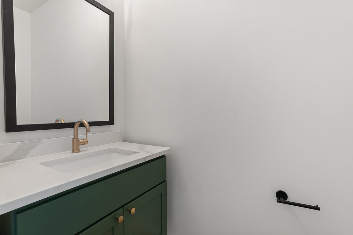 6010 Adhara Pass Austin, TX 78730 - Photo 25 of 40 a bathroom with a sink and a mirror