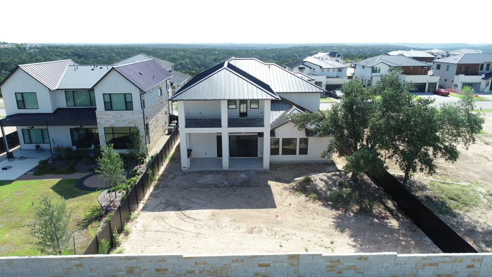 6010 Adhara Pass Austin, TX 78730 - Photo 39 of 40 a aerial view of a house with a yard