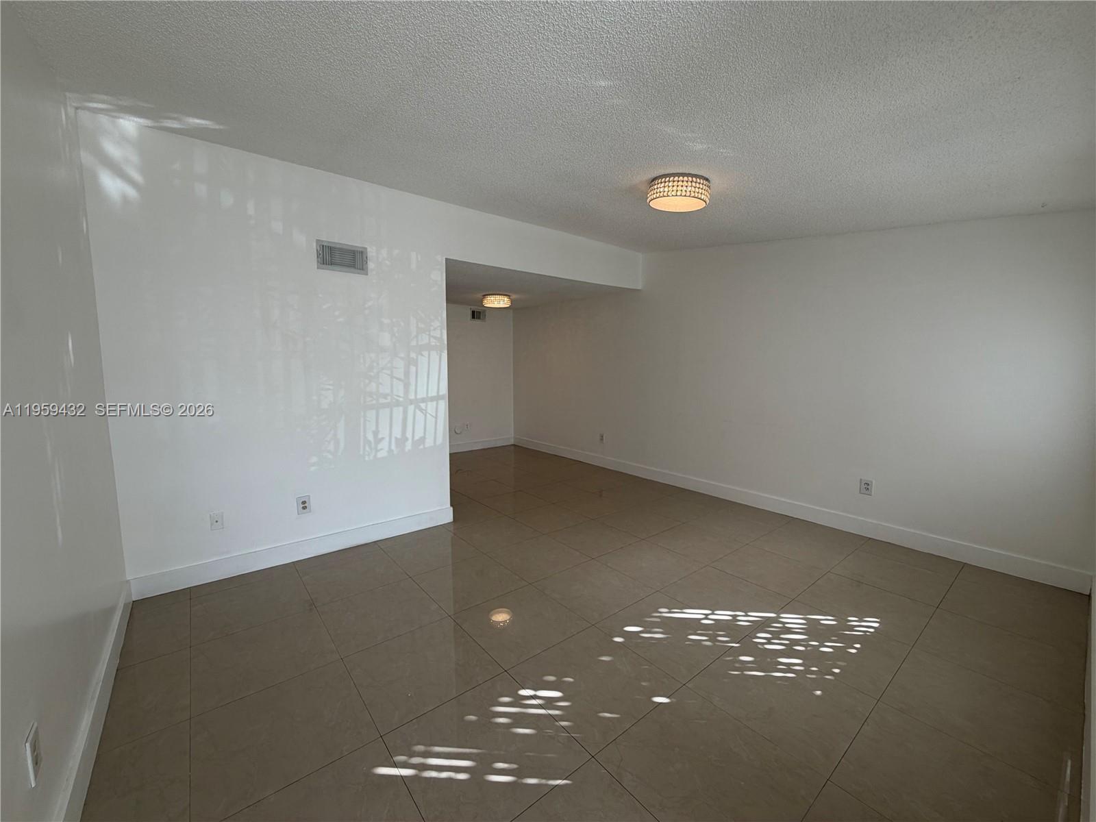 6934 Northwest 166th Terrace, Unit 1402 Miami Lakes, FL 33014 - Photo 2 of 13 a view of room