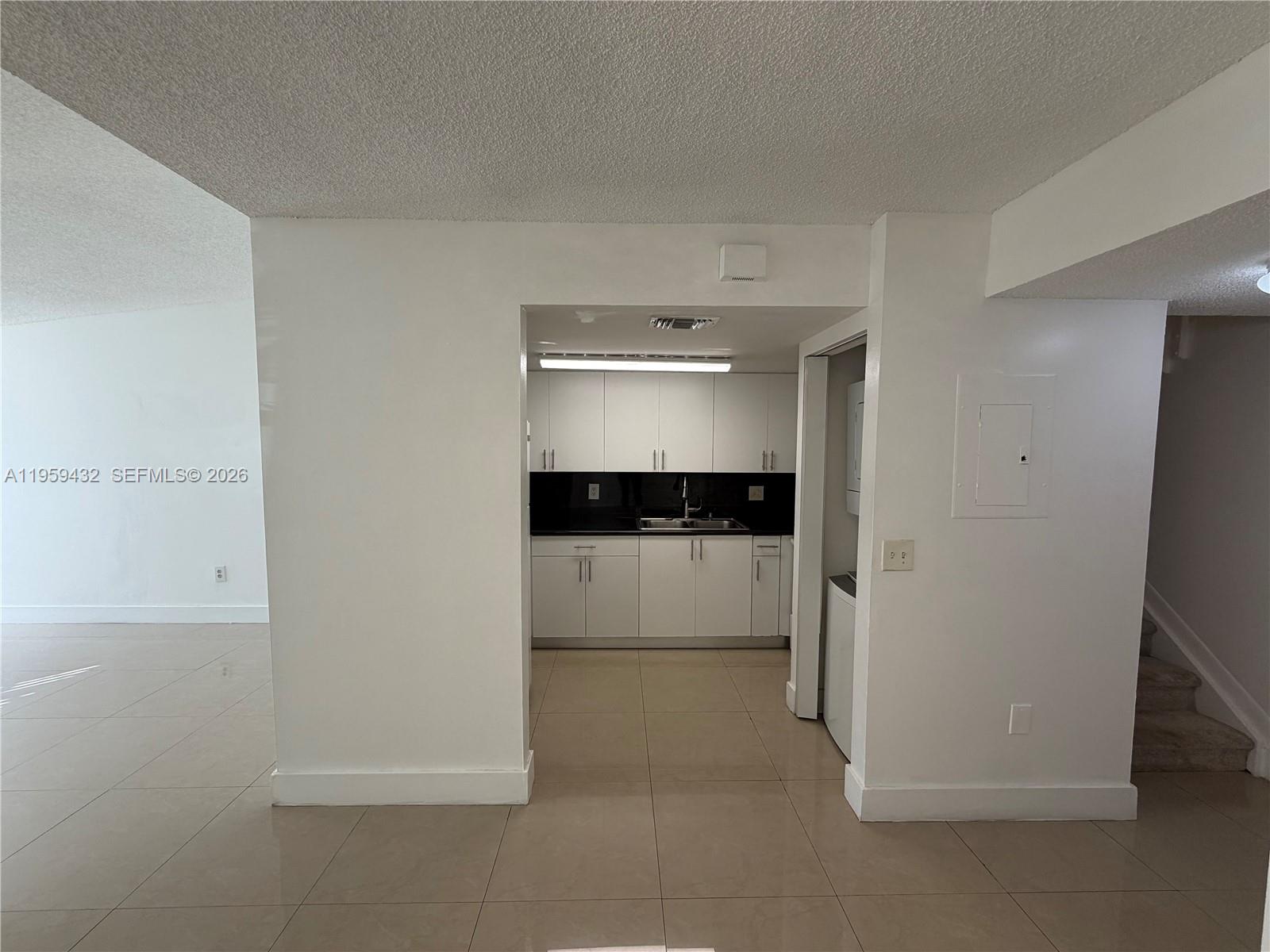 6934 Northwest 166th Terrace, Unit 1402 Miami Lakes, FL 33014 - Photo 5 of 13 a view of walk in closet