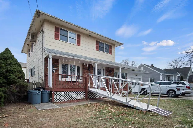 a view of a house with a roof deck
