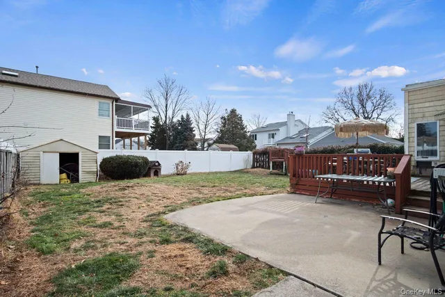 a view of a chairs and tables in the patio