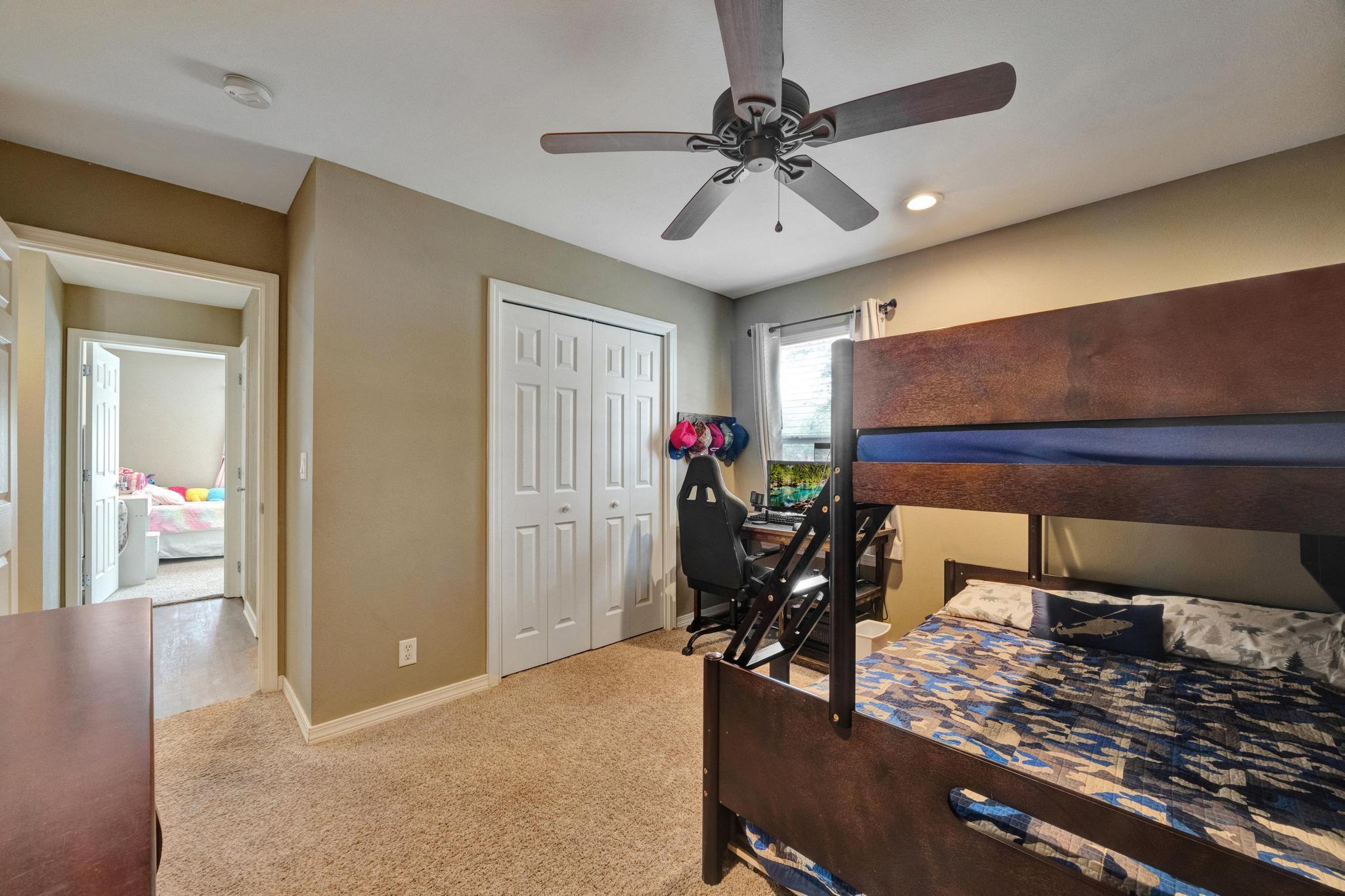 1141 Country Living Road Baker, FL 32531 - Photo 35 of 60 a living room with furniture and a chandelier
