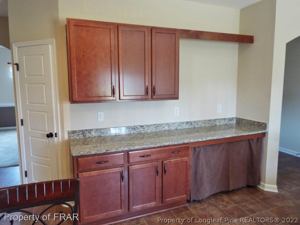 14 Citadel Street Cameron, NC 28326 - Photo 12 of 33 a view of cabinets with wooden floor