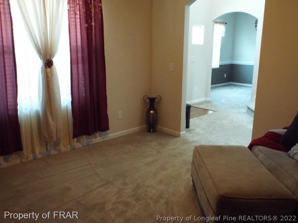 14 Citadel Street Cameron, NC 28326 - Photo 17 of 33 a living room with furniture and a window