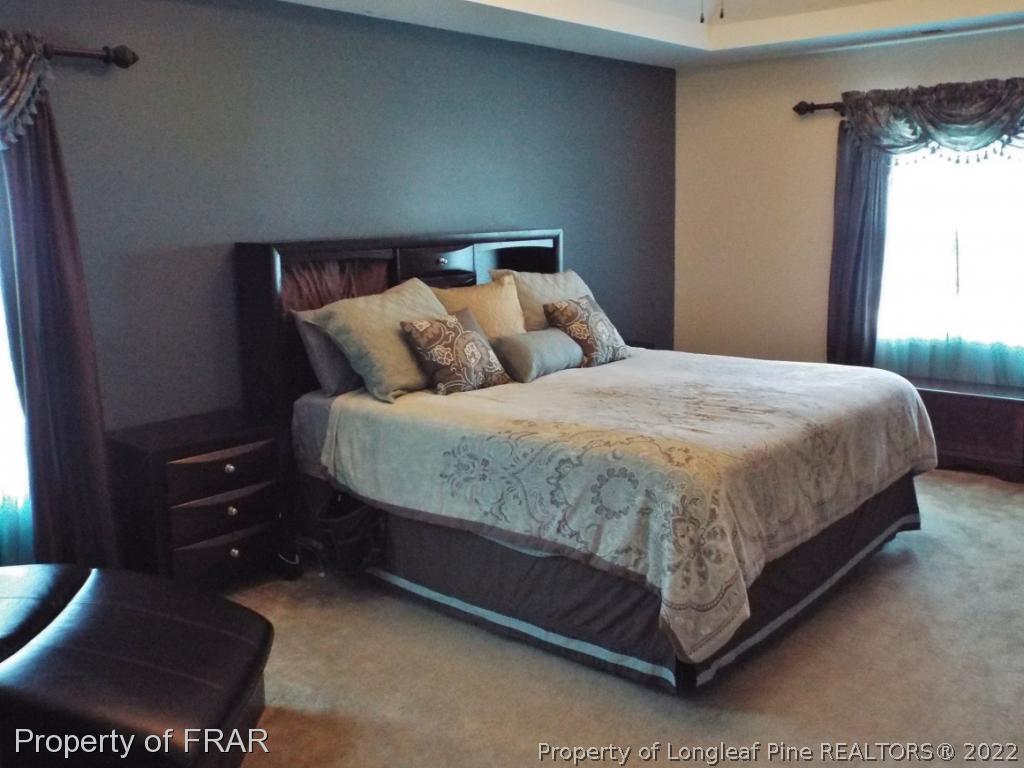 14 Citadel Street Cameron, NC 28326 - Photo 18 of 33 a bedroom with a bed and window