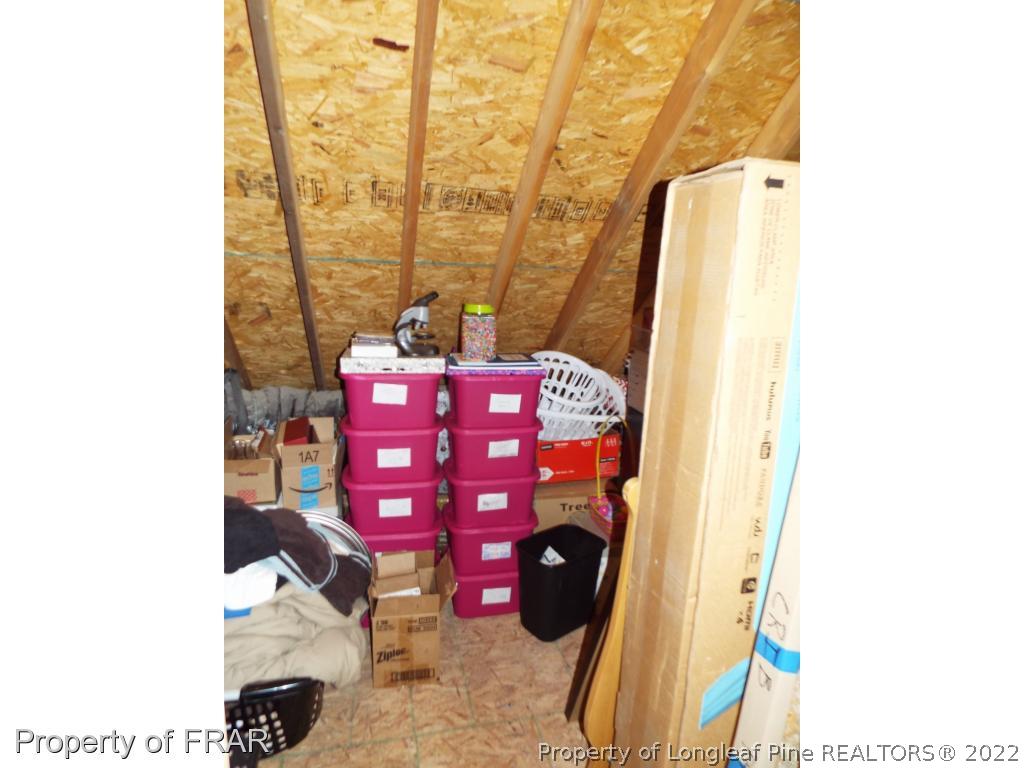 14 Citadel Street Cameron, NC 28326 - Photo 33 of 33 a bedroom with a bed and a closet