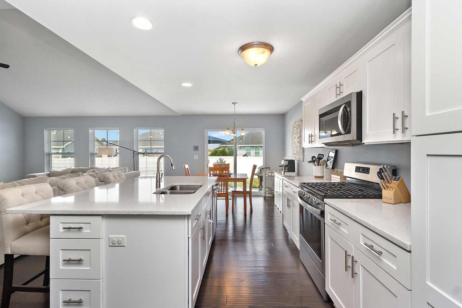 6104 Park View Drive Bourbonnais, IL 60914 - Photo 11 of 31 a kitchen with sink stove and cabinets