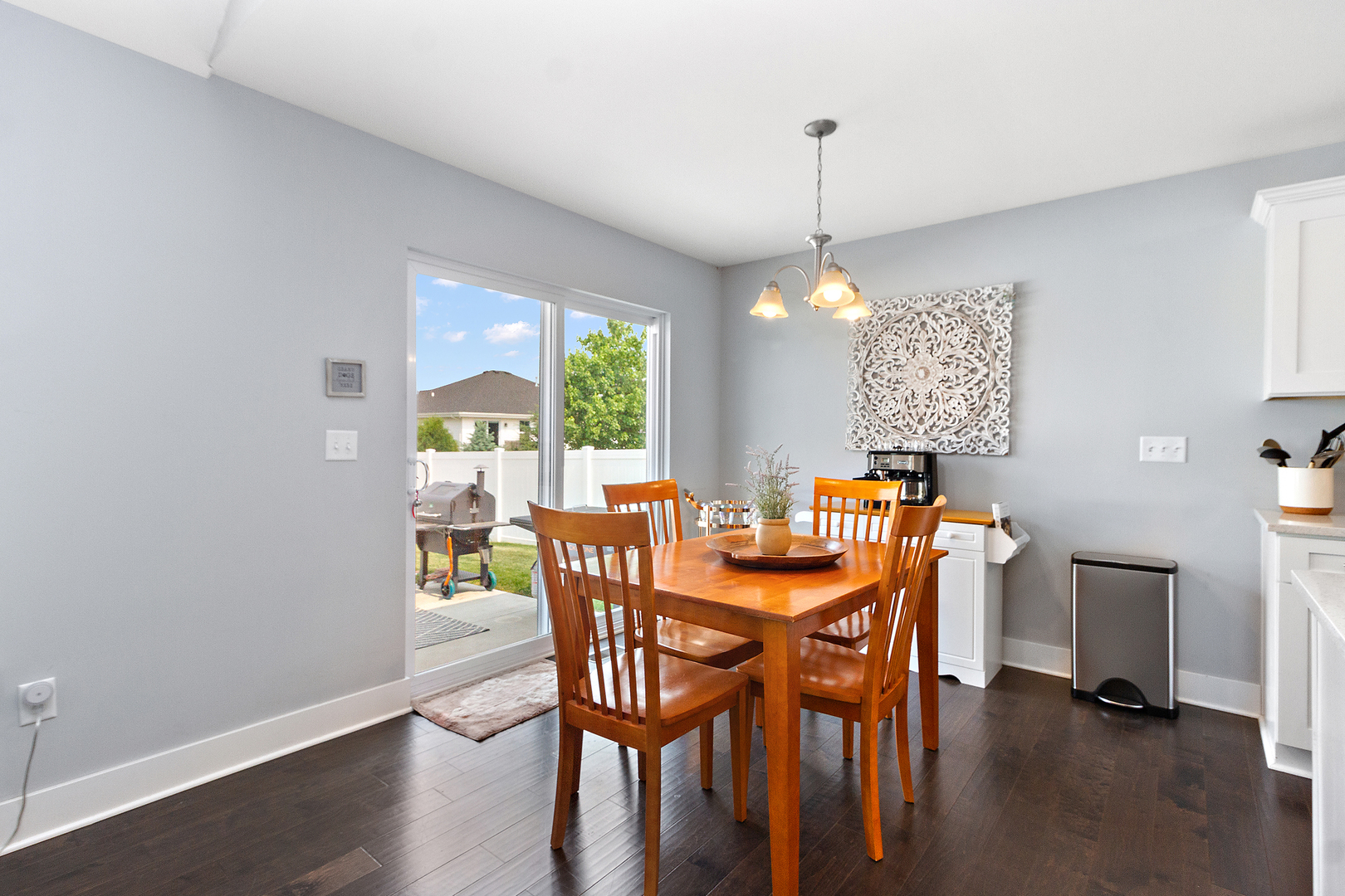6104 Park View Drive Bourbonnais, IL 60914 - Photo 13 of 31 a view of a dining room with furniture window and wooden floor