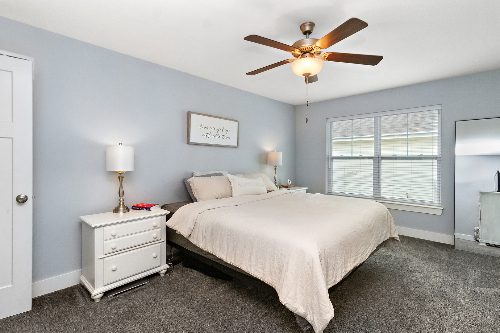 6104 Park View Drive Bourbonnais, IL 60914 - Photo 16 of 31 a bed room with a bed and a ceiling fan