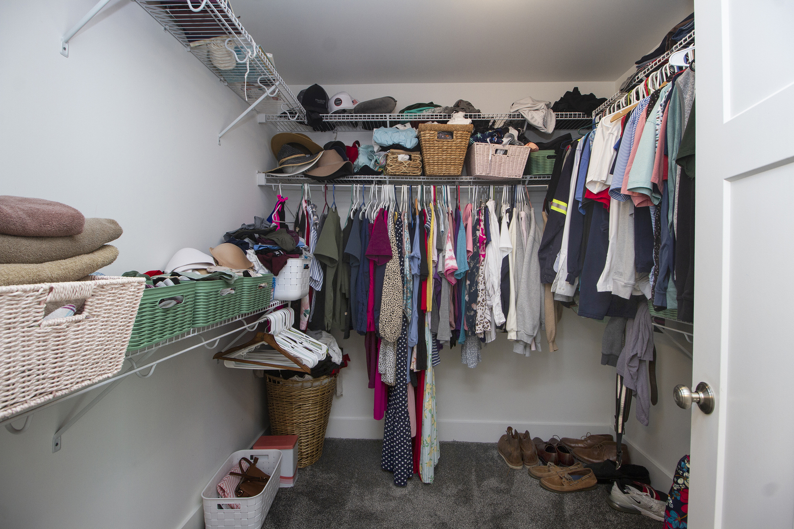 6104 Park View Drive Bourbonnais, IL 60914 - Photo 19 of 31 a view of walk in closet with clothes and shoes