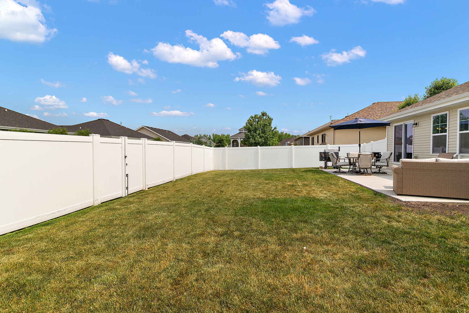 6104 Park View Drive Bourbonnais, IL 60914 - Photo 28 of 31 a view of an house with backyard and sitting area