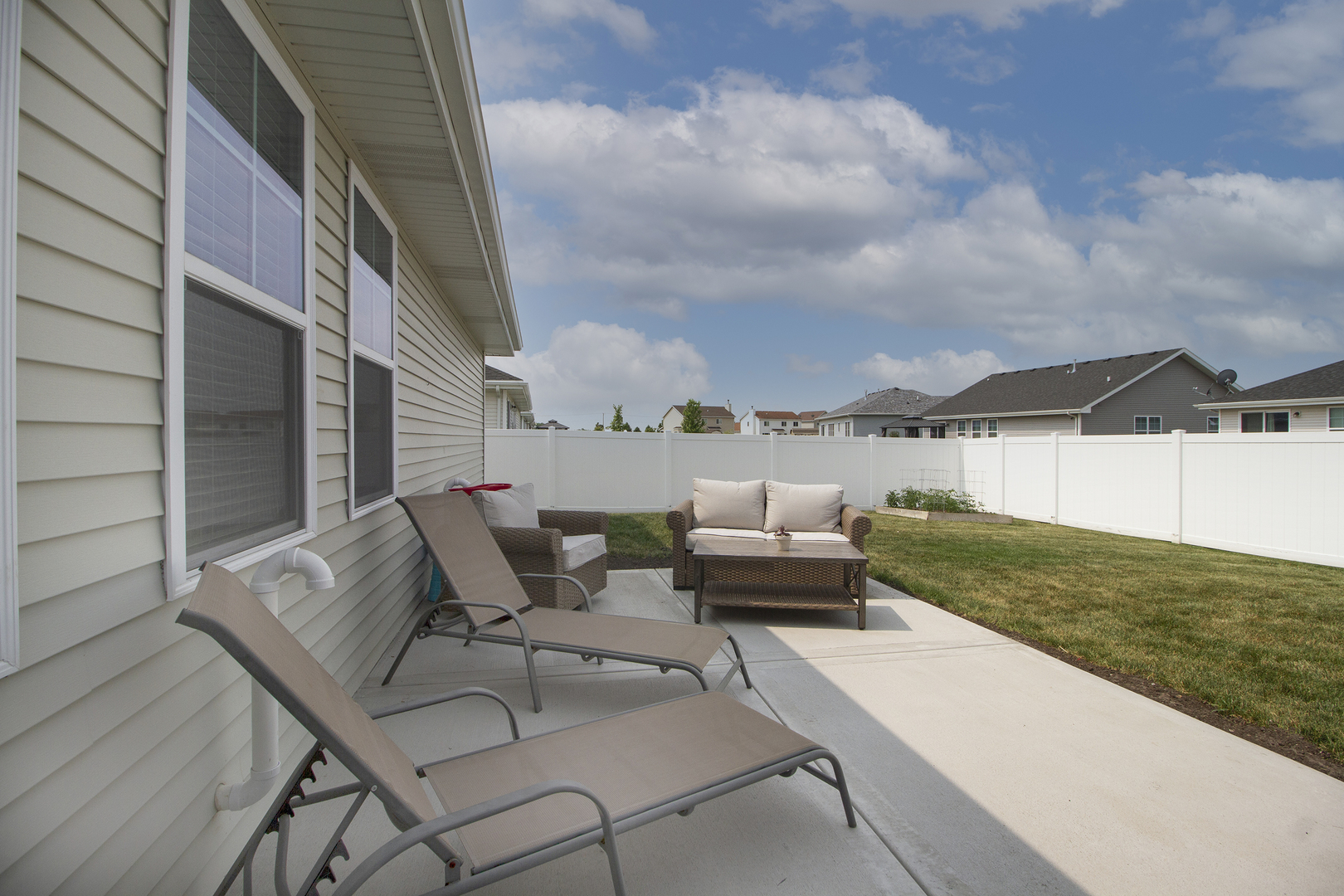 6104 Park View Drive Bourbonnais, IL 60914 - Photo 30 of 31 a terrace with outdoor seating and city view