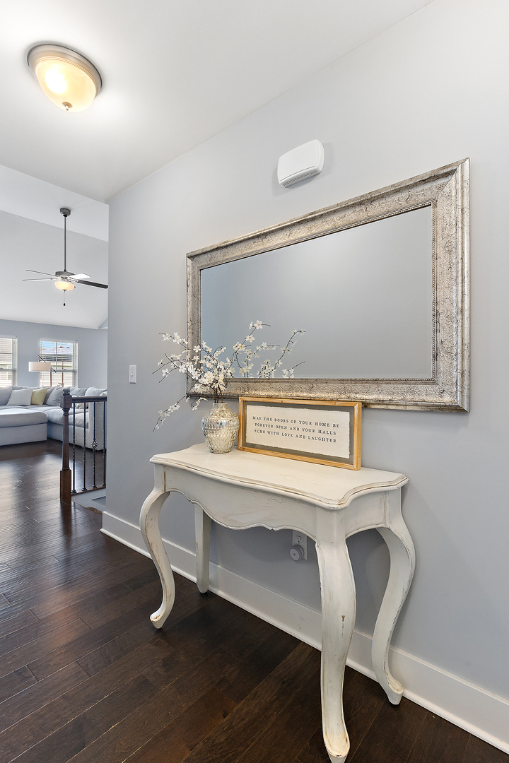 6104 Park View Drive Bourbonnais, IL 60914 - Photo 4 of 31 a view of a dining room with furniture and wooden floor