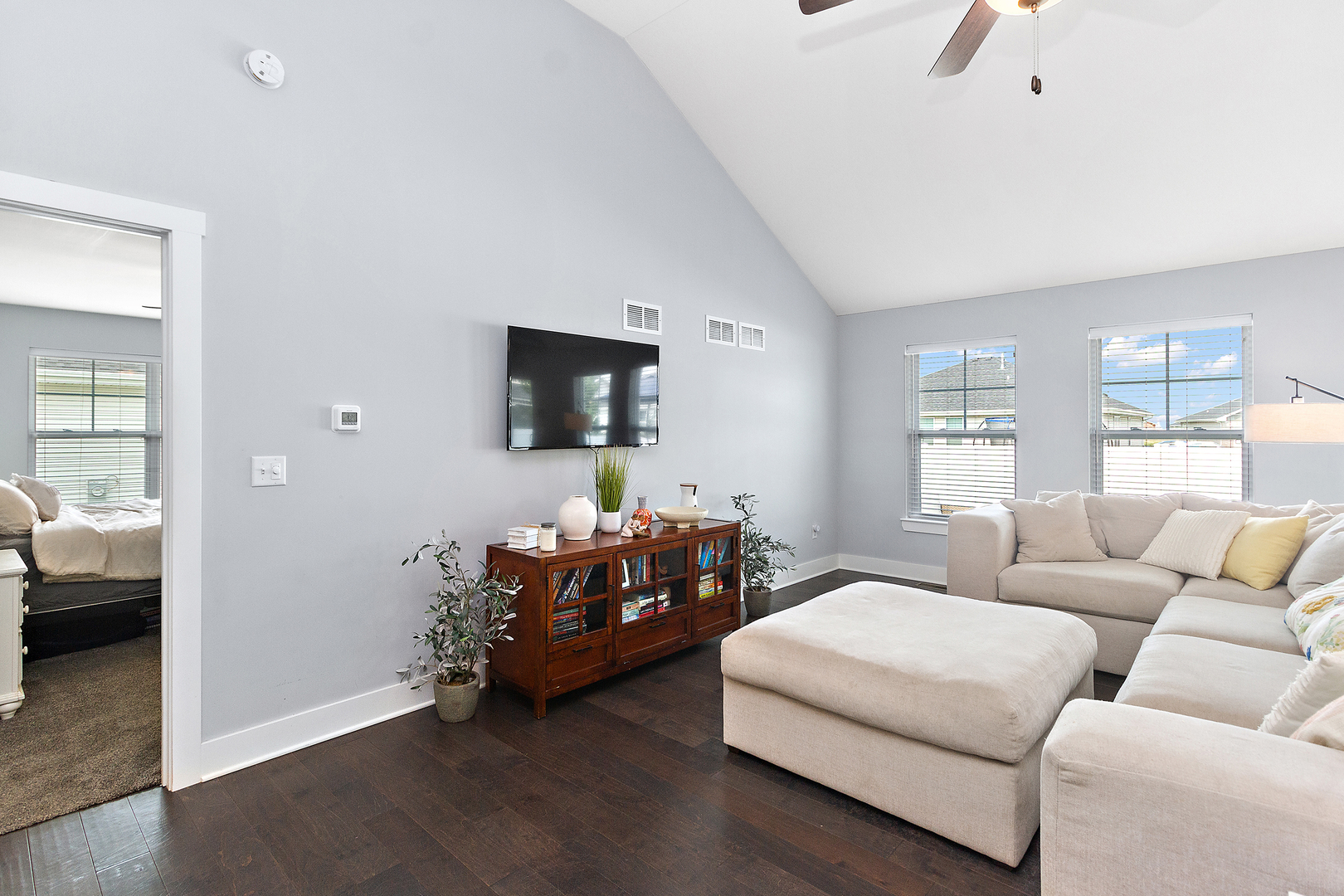 6104 Park View Drive Bourbonnais, IL 60914 - Photo 6 of 31 a living room with furniture and a flat screen tv