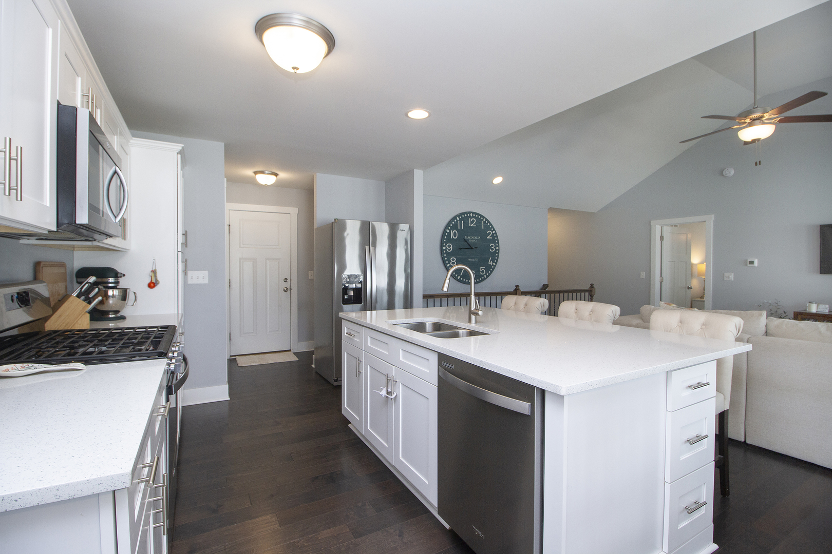 6104 Park View Drive Bourbonnais, IL 60914 - Photo 9 of 31 a kitchen with a sink a stove a refrigerator and cabinets