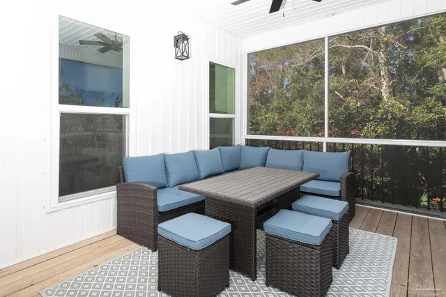 a living room with furniture and a table