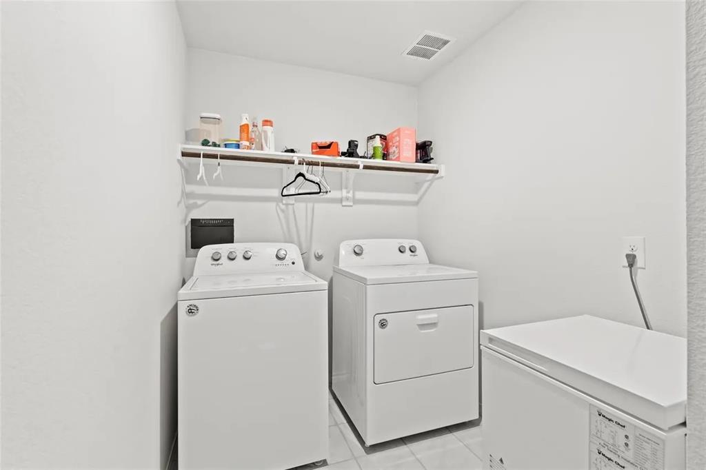 171 Seabiscuit Road Caddo Mills, TX 75135 - Photo 11 of 19 a utility room with dryer and washer