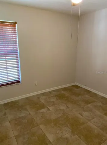 a view of a room with a window