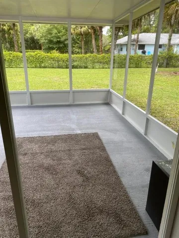 a view of outdoor space with seating area