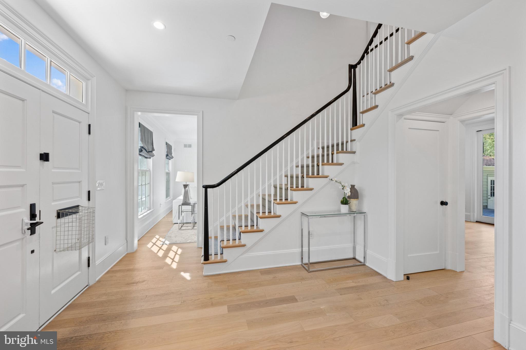 3849 Macomb Street Northwest Washington, DC 20016 - Photo 2 of 60 a view of entryway and hall with wooden floor
