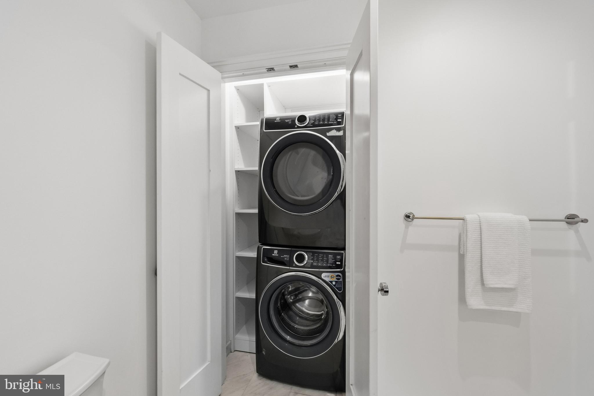 3849 Macomb Street Northwest Washington, DC 20016 - Photo 26 of 60 a utility room with sink dryer and washer