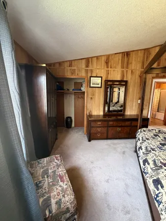 a view of livingroom with furniture and windows