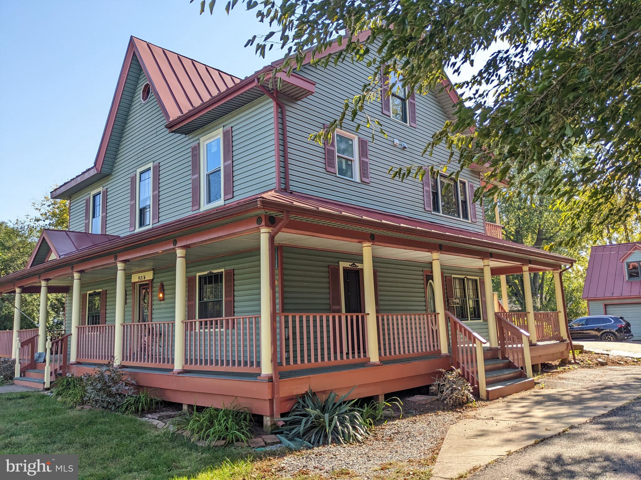 9014 Sudley Road Manassas, VA 20110 - Photo 6 of 34 Wrap around porch available to some units