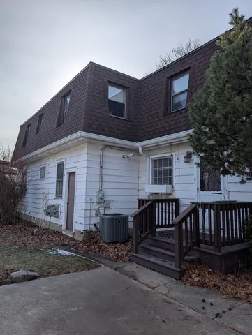 a view of a sink in wooden wall