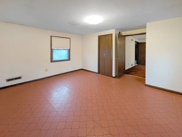 an empty room with windows