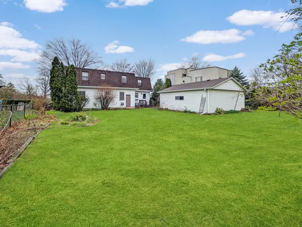 a house view with a garden space