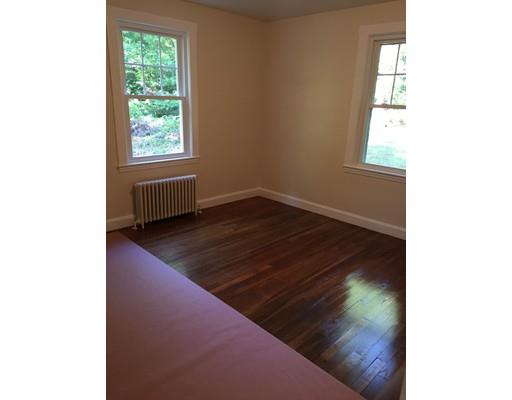 4 Wares Road Ashby, MA 01431 - Photo 7 of 17 a living room with a bed and a window