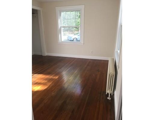 4 Wares Road Ashby, MA 01431 - Photo 8 of 17 a view of an empty room with wooden floor and a window