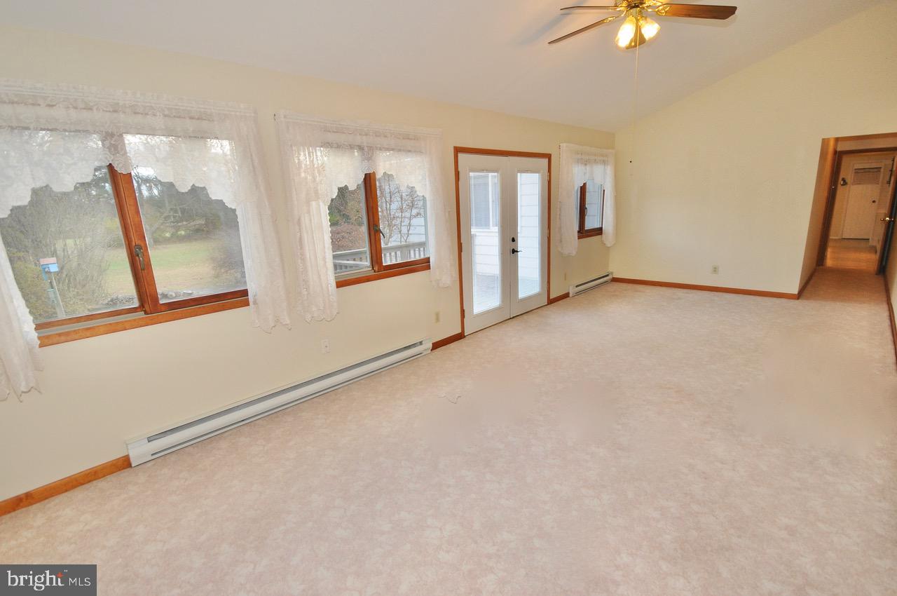 2122 Jacksonville Jobstown Road Jobstown, NJ 08041 - Photo 49 of 75 Apt: Living Room with View of Rear Yard and Deck