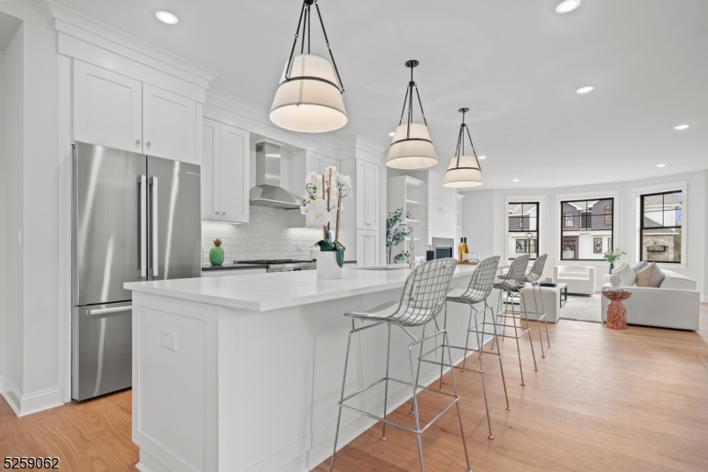 a kitchen with counter top space cabinets and stainless steel appliances