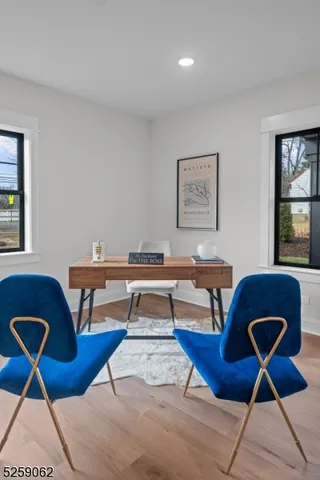 a living room with furniture and rug