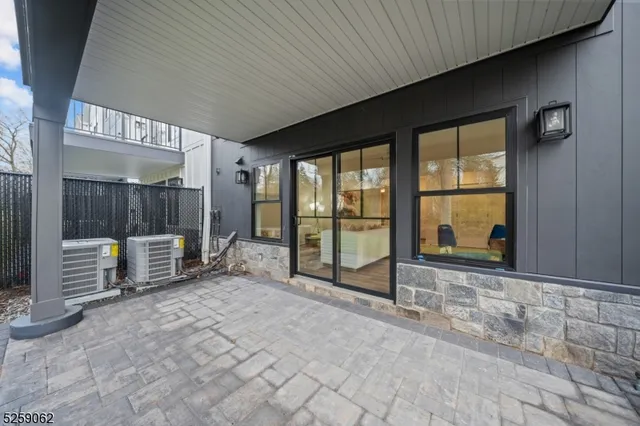 a view of a room with a large window