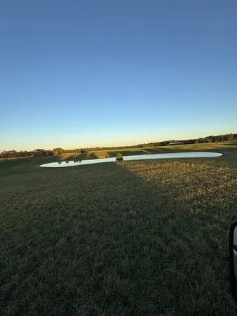 a view of an ocean with a mountain