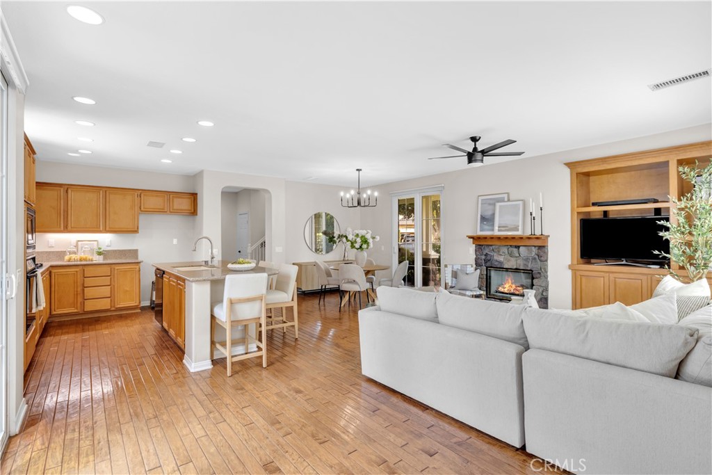 78 Dawnwood Ladera Ranch, CA 92694 - Photo 12 of 54 a living room with furniture and a fireplace