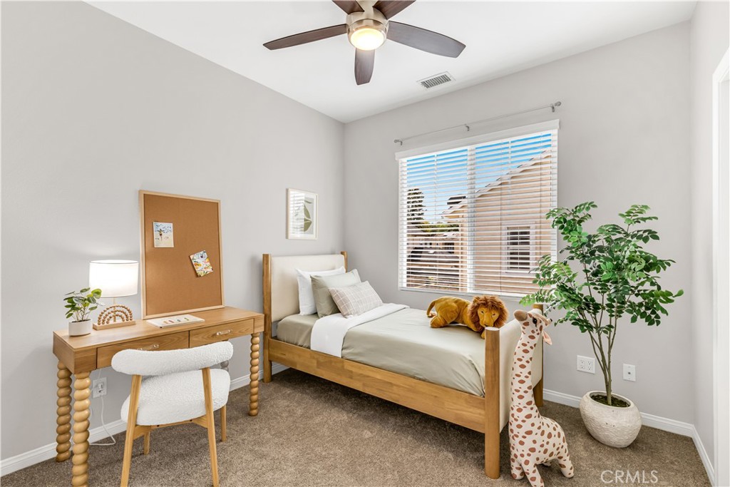 78 Dawnwood Ladera Ranch, CA 92694 - Photo 22 of 54 a bedroom with a bed and a potted plant