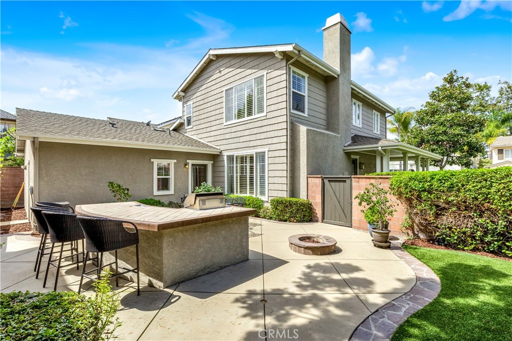 78 Dawnwood Ladera Ranch, CA 92694 - Photo 29 of 54 a view of a house with backyard sitting area and garden