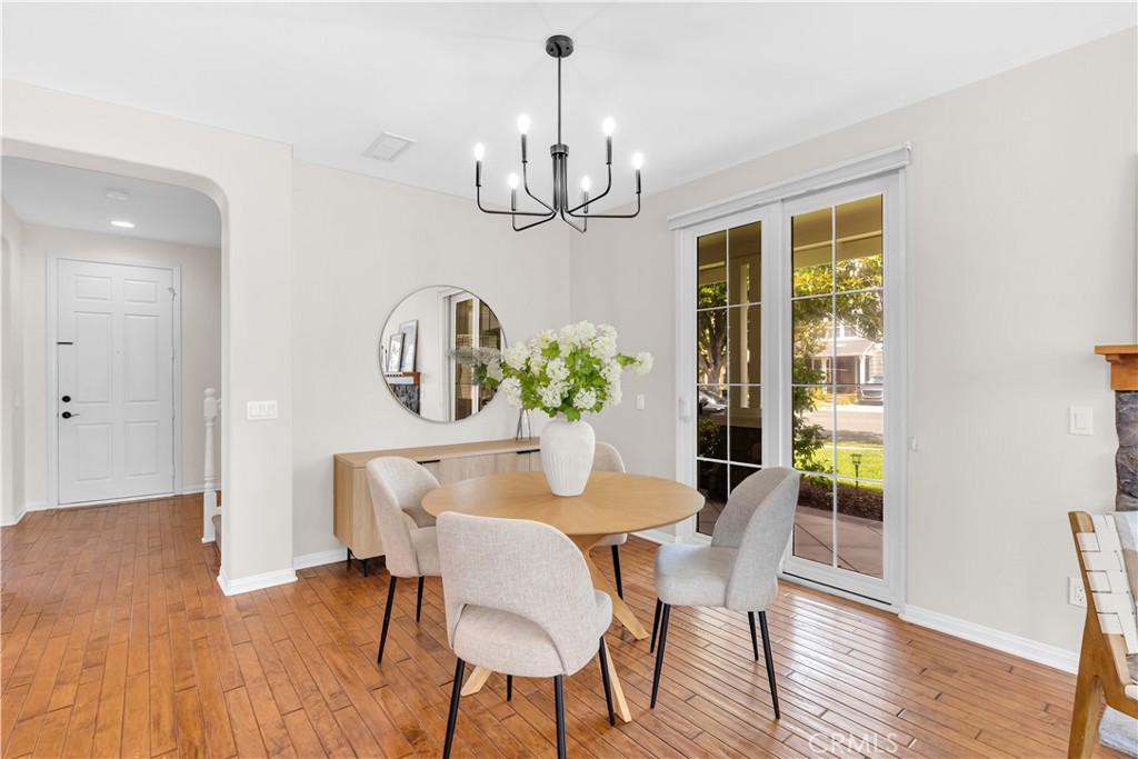78 Dawnwood Ladera Ranch, CA 92694 - Photo 7 of 54 a view of a dining room with furniture wooden floor and chandelier