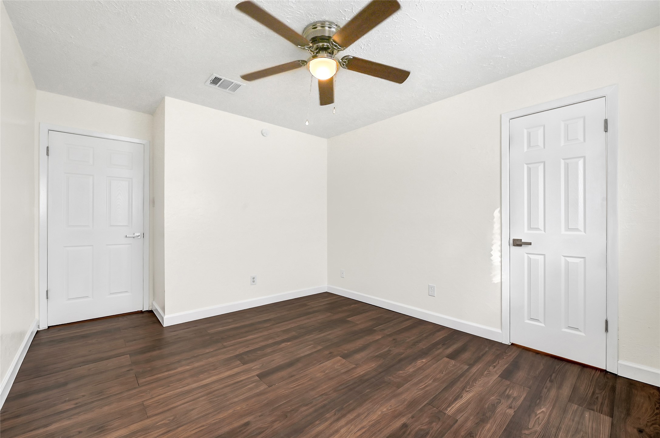 15907 Timber Valley Drive Houston, TX 77070 - Photo 20 of 27 wooden floor in an empty room