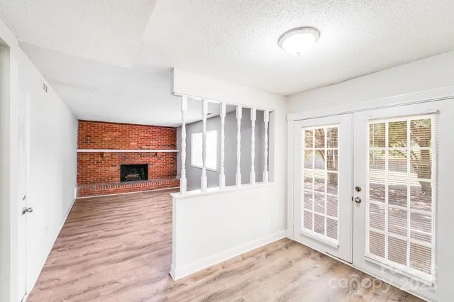 an empty room with windows