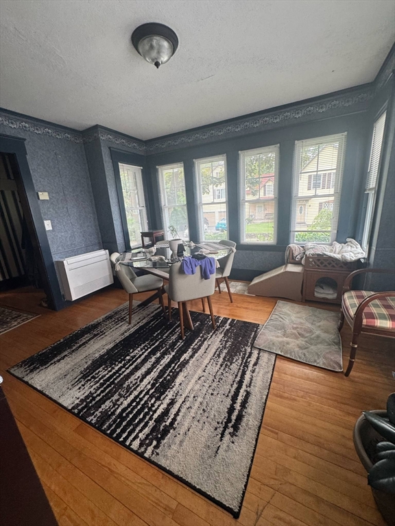 104 Maple Street Gardner, MA 01440 - Photo 11 of 15 a living room with furniture rug and a large window